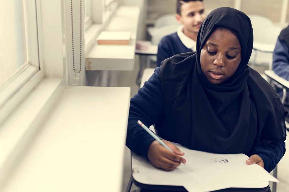 A student writing in class
